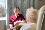 team leader care home taking care of a resident